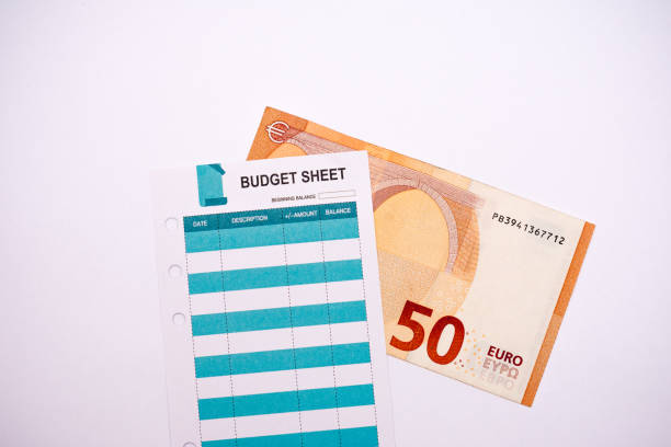 istock A budget sheet and a fifty euro bill 2182795681