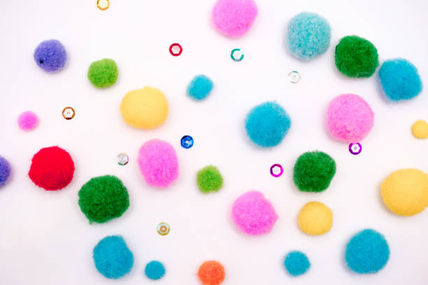 istock A bunch of pom poms in various colors 2182795727