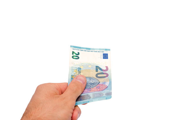istock A hand holding a twenty euro bill 2182795767