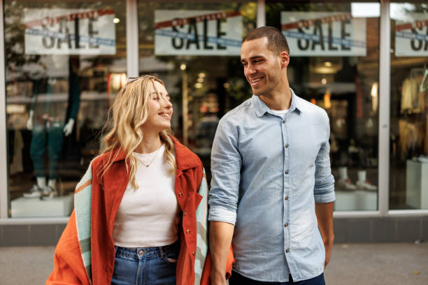 istock Young couple enjoying shopping 2182800469