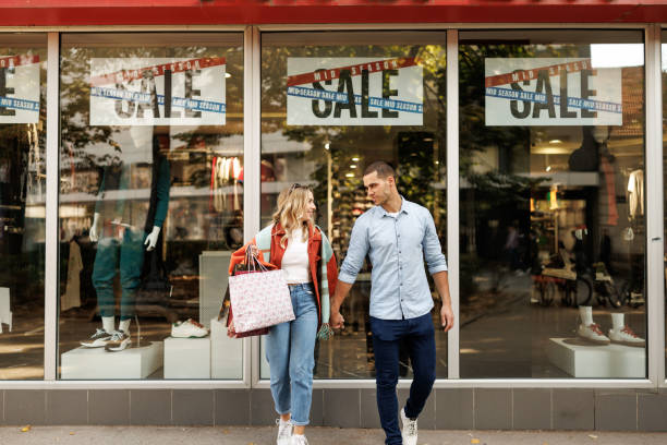 istock Young couple enjoying shopping 2182801121