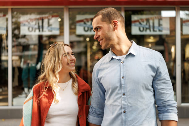 istock Young couple enjoying shopping 2182801250