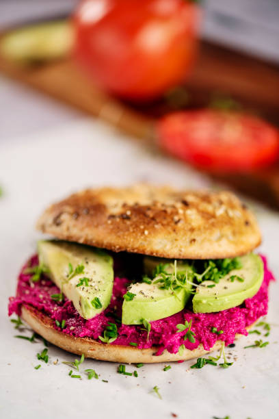 istock Vegan Bagel with Avocado and Beetroot Hummus 2182801547