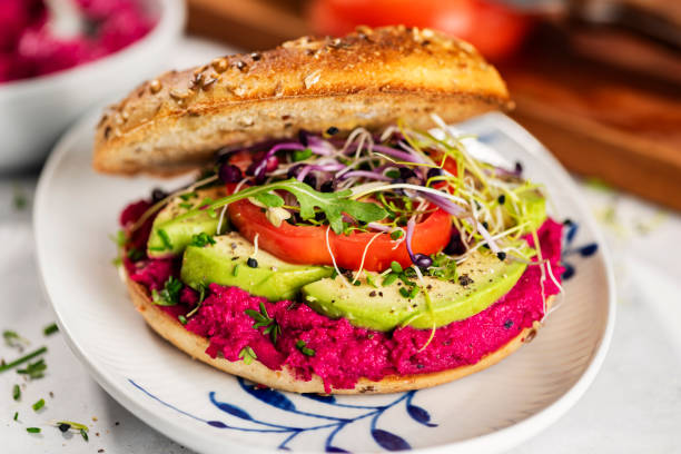 istock Vegan Bagel with Avocado and Beetroot Hummus 2182801600