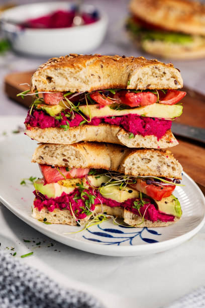 istock Vegan Bagels with Avocado and Beetroot Hummus 2182801615