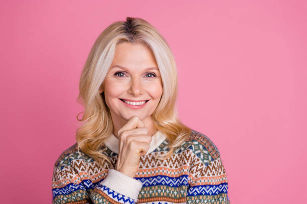 istock Photo of nice aged lady think empty space wear pullover isolated on pink color background 2182804085