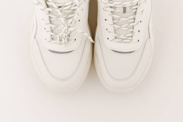istock the new white sneakers on a white . 2182805107