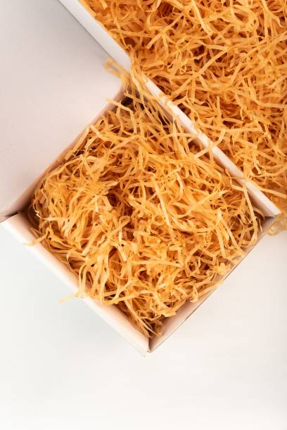 istock Confetti gift box filler in the box on white background 2182806210