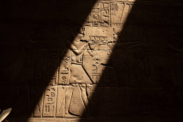 Hieroglyphs and drawings of Egyptian gods
