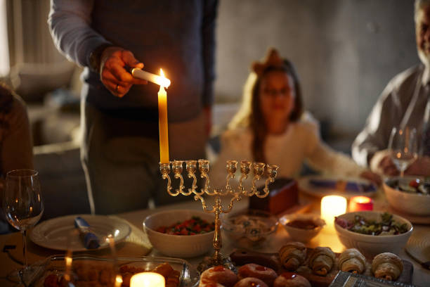 istock Lightning candles on Menorah during Hanukkah celebration! 2182809886