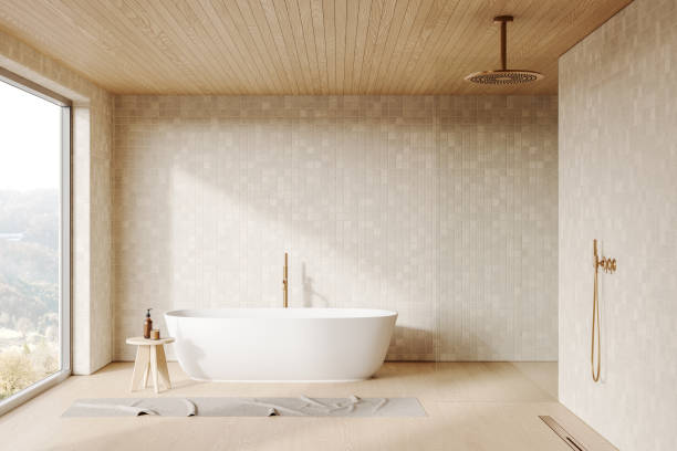 istock Light hotel bathroom interior with bathtub and glass shower, panoramic window 2182814727