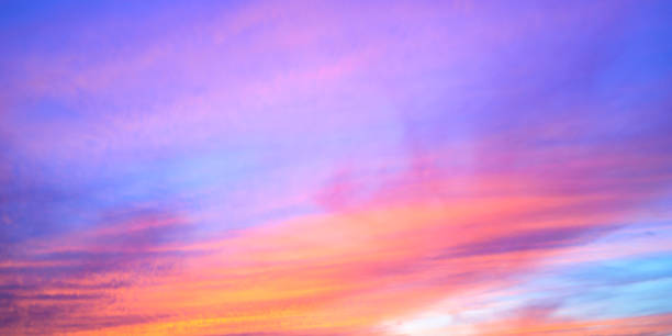 istock Colorful clouds in a blue sky during sunset 2182814742
