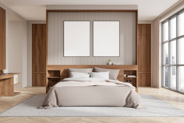 istock Bedroom interior with two blank posters above bed on wooden wall. 3D Rendering 2182814779