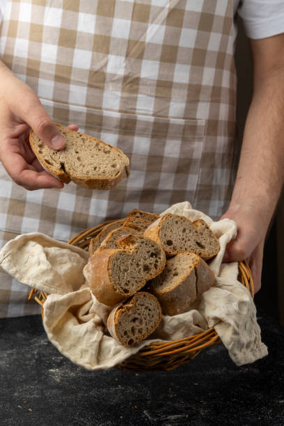 istock Rustic bread on wooden board with flour on the side. 2182816997