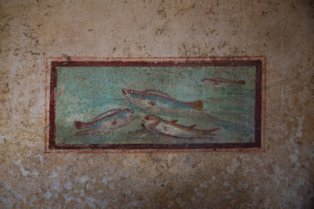 istock Pompeii fresco painting fish on wall 2182818018