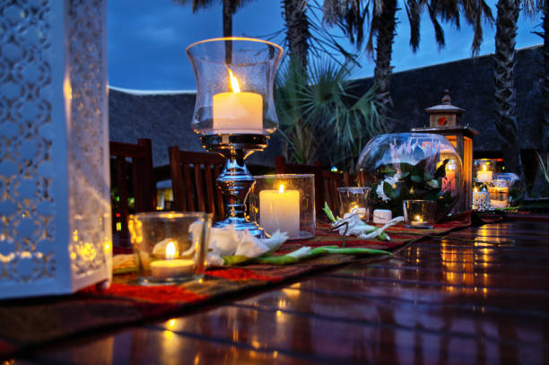 table deco with candles at a tropical resort in the night romantic