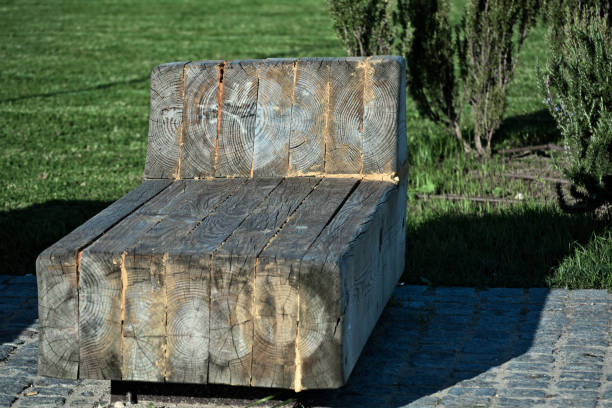 Wooden bench in river pedestrian area