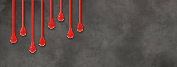 Red ink drops on dark concrete wall. Horizontal banner