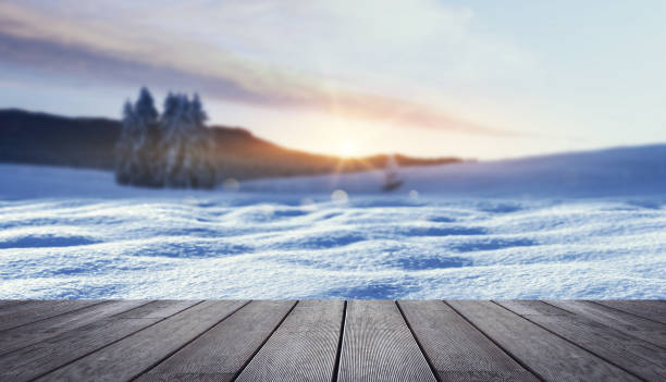 istock Wintry landscape and wooden walkway background 2182820890