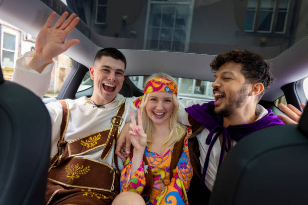 istock Fancy Dressed Friends in the Back Seat 2182824111