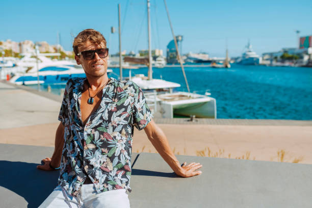 istock Handsome man sitting at port 2182825505