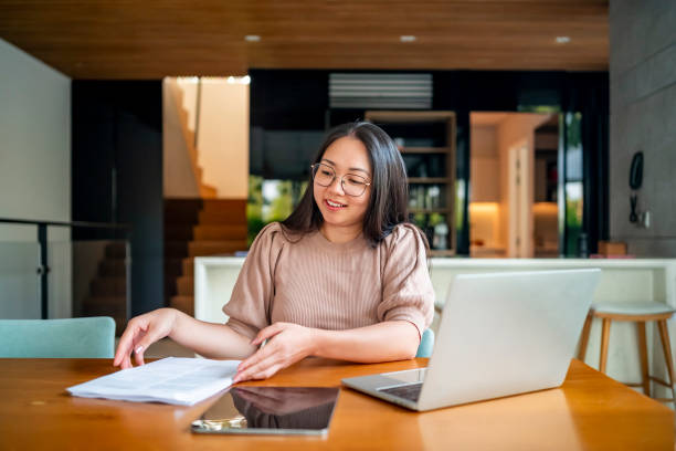 istock Young Professional Woman Working Remotely From Home Office 2182833911