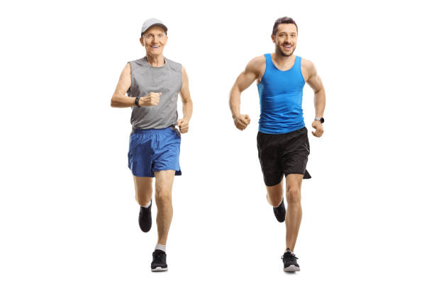 istock Elderly and young man jogging together 2182836226