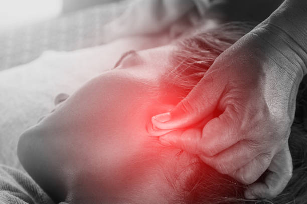 istock Woman during professional and healing earlobe massage 2182836468