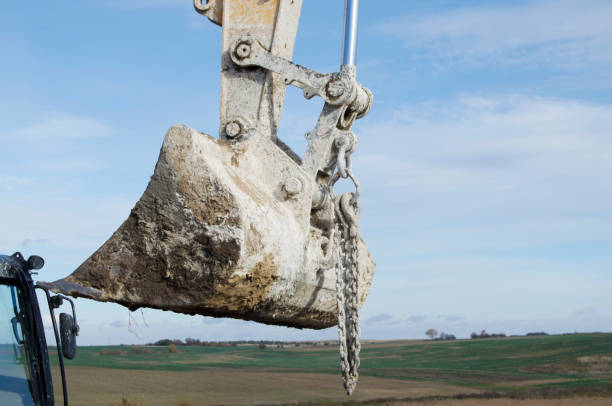 istock Excavator and other construction equipment.Building activity on contruction site. 2182837225