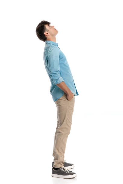 istock attractive 20 years old student standing in line and looking up 2182839182
