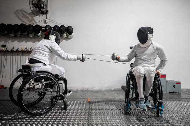 istock People practicing fencing at a health club 2182851005