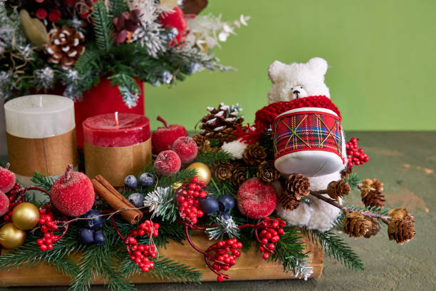 istock Christmas arrangement with red candles and polar bear 2182853716