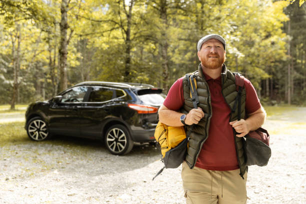 istock Handsome redhead man at a lake during an alpine forest bathing meditation trip 2182856217