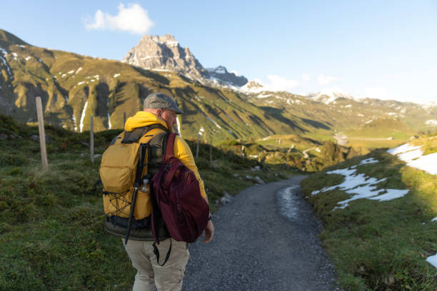 istock Handsome senior man during a alpine getting back to nature trip 2182858548