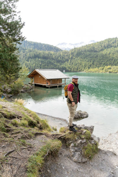 istock Handsome senior man during a alpine getting back to nature trip 2182859082
