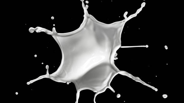 istock Round milk splash isolated on black background. 2182860317
