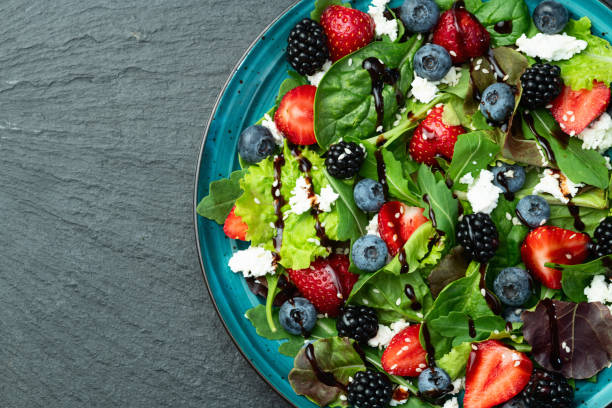 istock Berries salad (blueberry strawberry blackberry ) with cheese feta and balsamic sauce 2182866307