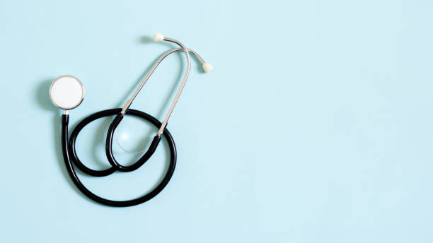 istock New stethoscope on blue background, top view. medical instrument 2182867747