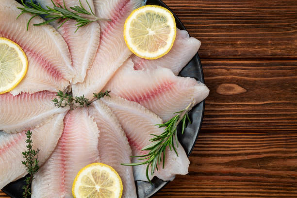 istock Raw tilapia fillet photography . Top view 2182868454