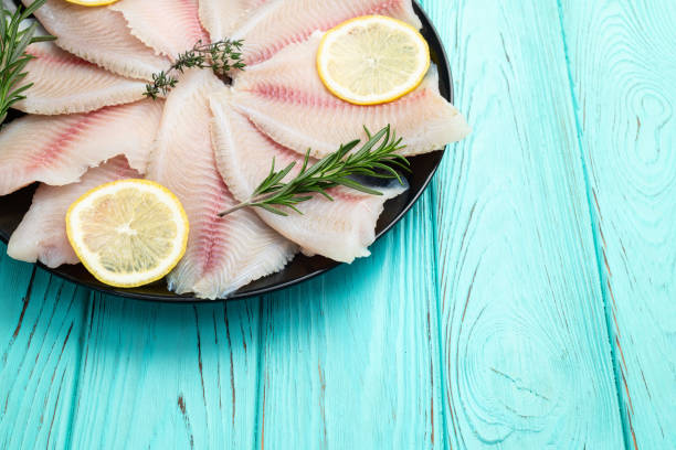 istock Raw tilapia fillet photography . Top view 2182868459