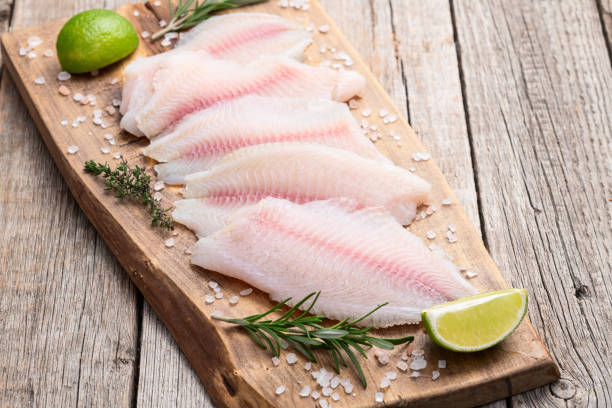 istock Raw tilapia fillet photography . Top view 2182868464