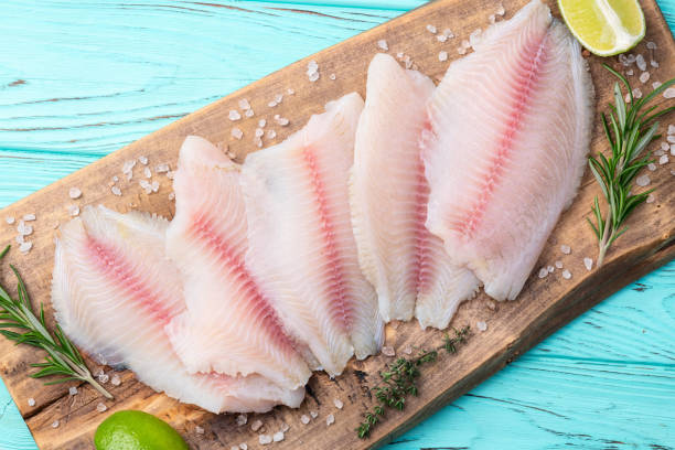 istock Raw tilapia fillet photography . Top view 2182868467