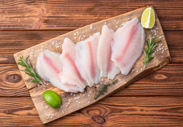 istock Raw tilapia fillet photography . Top view 2182868476