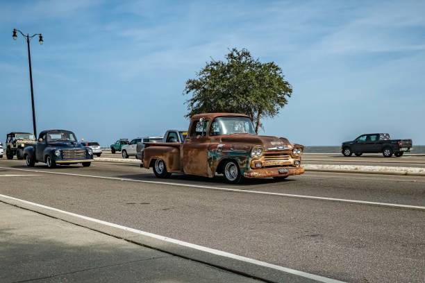 Gulfport, MS - October 04, 2023: Wide angle front corner view of a 1958 Chevrolet Apache 3100 Stepside Pickup Truck at a local car show.