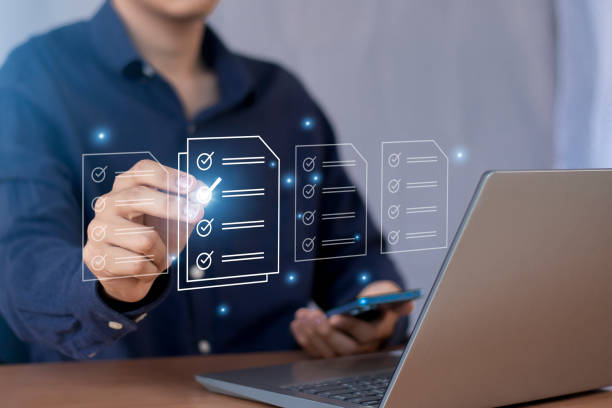 istock Electronic document review on virtual screens Businessman checks electronic documents, borderless communication technology 2182874217