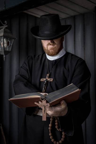 istock Handsome redhead Cowboy priest in an authentic wild west setting 2182875237