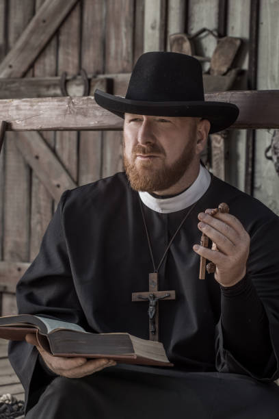 istock Handsome redhead Cowboy priest in an authentic wild west setting 2182875550