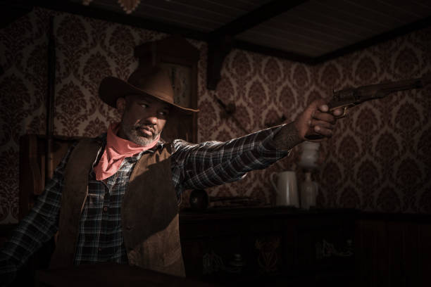 istock Handsome Black Cowboy in an authentic wild west setting 2182875945