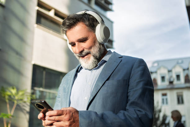istock Professional Taking a Break with Headphones and Coffee 2182878307