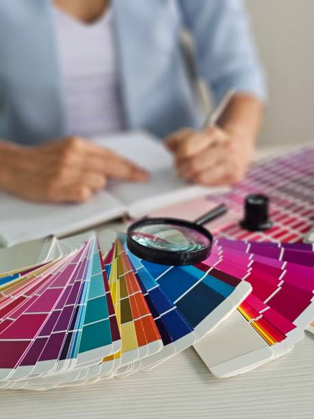 istock Design professional evaluating color palettes and sketching concepts 2182881781